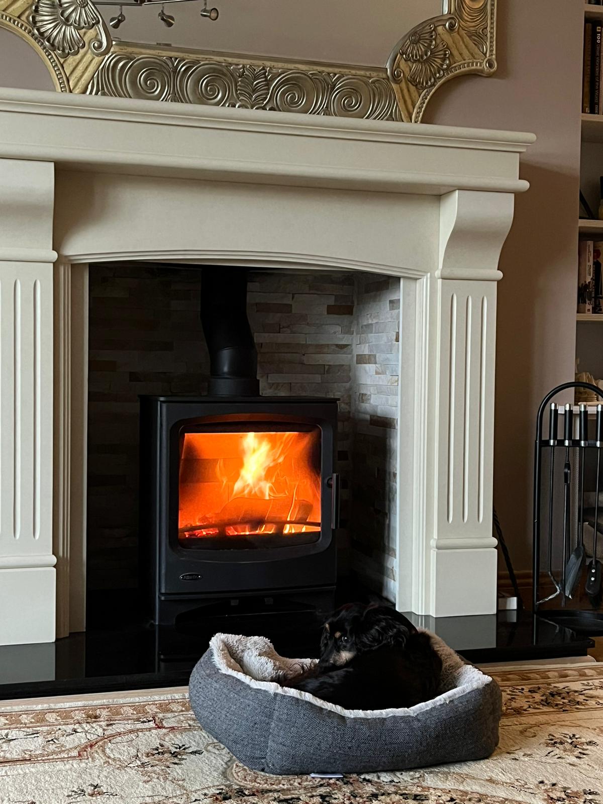 Alcove fitting with cream scroll mantel and stove